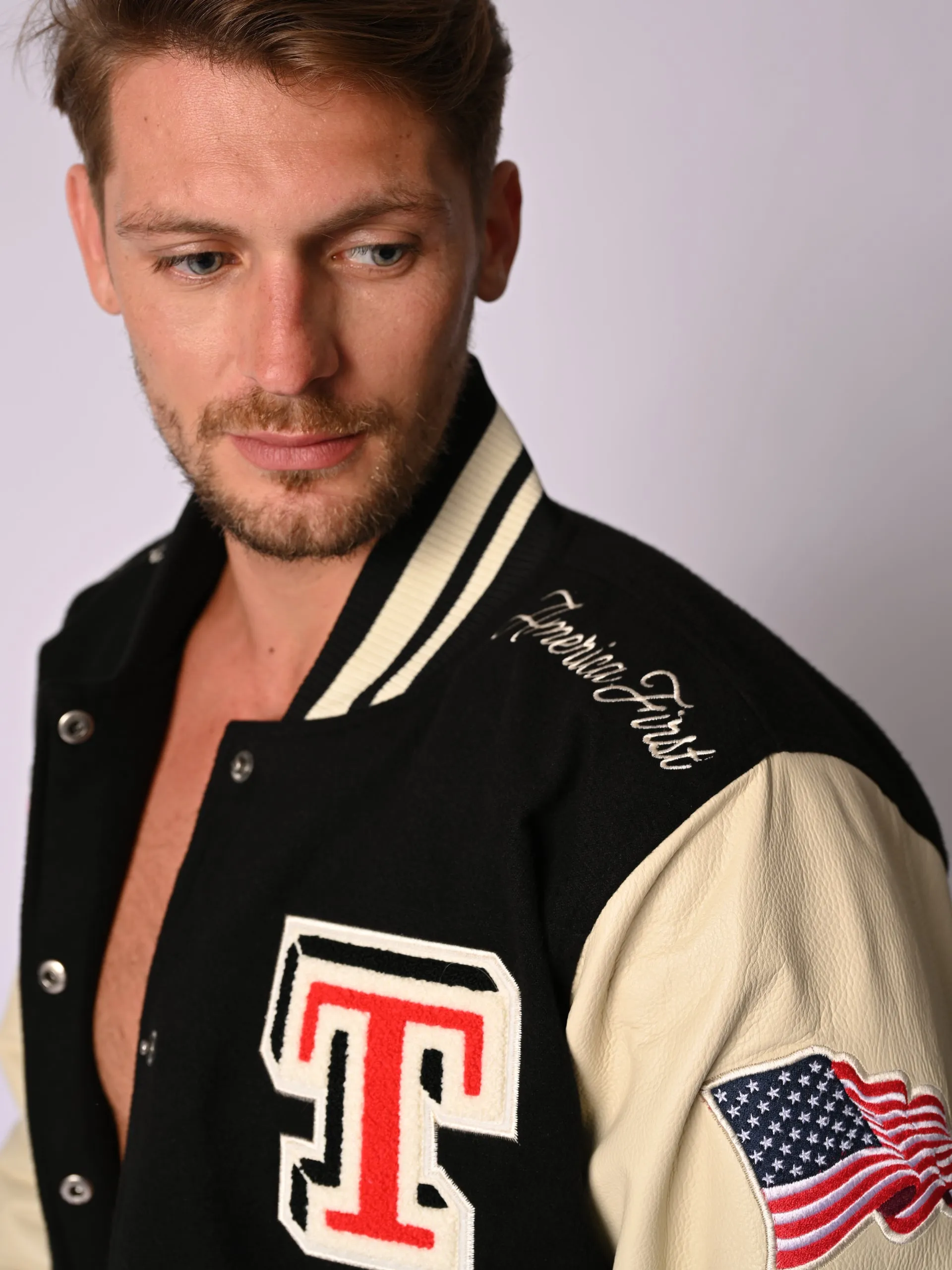 Black Varsity Jacket Never Surrender Wear