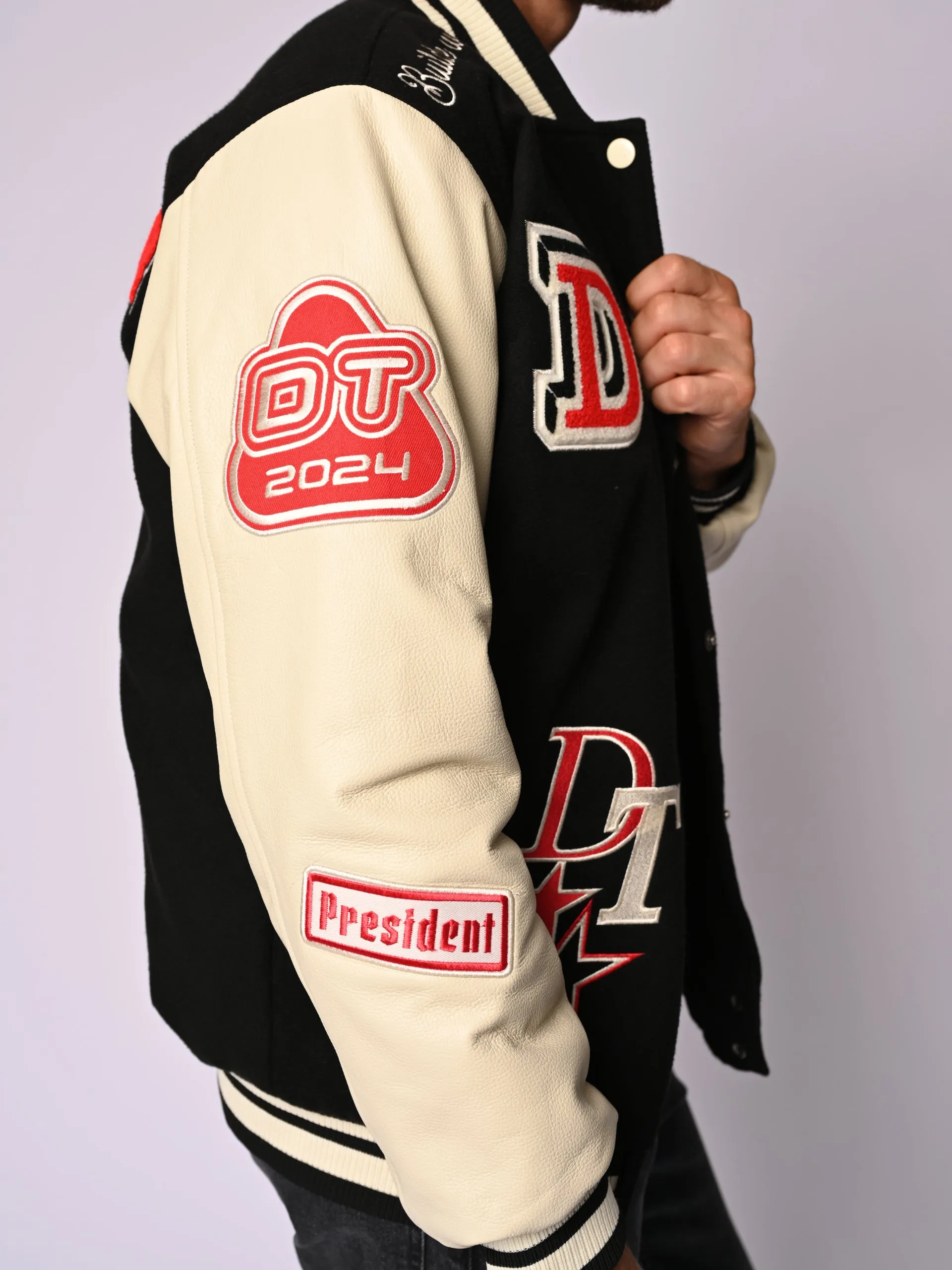 Black Varsity Jacket Never Surrender Wear