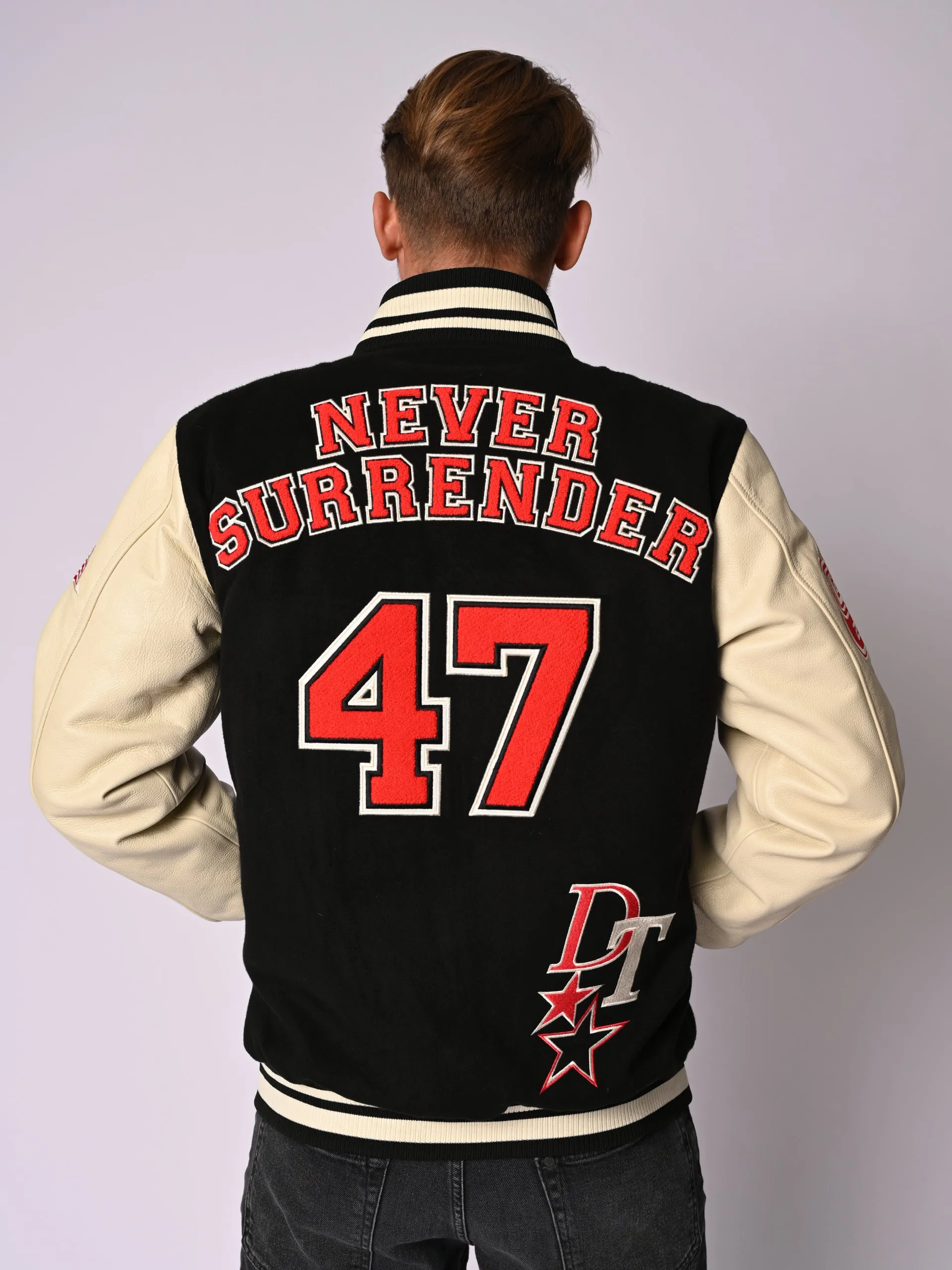 Black Varsity Jacket Never Surrender Wear