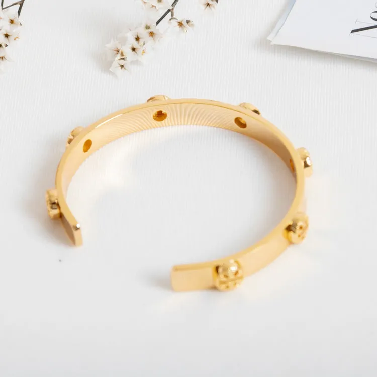Gold Milgrain Logo Cuff Bracelet