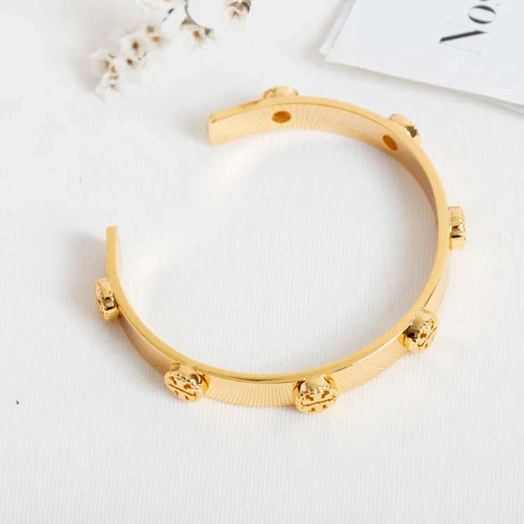 Gold Milgrain Logo Cuff Bracelet