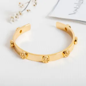 Gold Milgrain Logo Cuff Bracelet