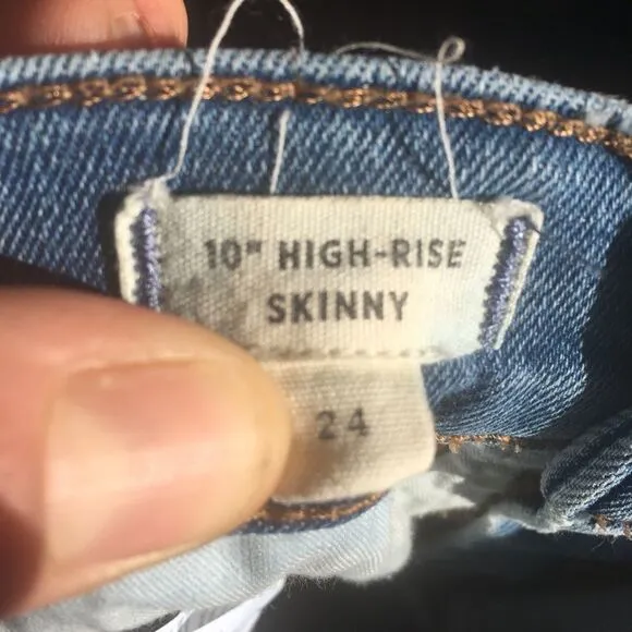 Madewell distressed multi button high rise jeans