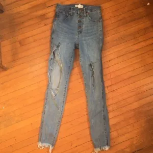Madewell distressed multi button high rise jeans