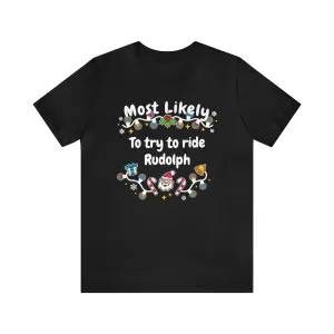 Most Likely To try To Ride Rudolph Unisex Deluxe Tee